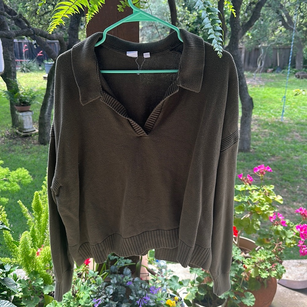 A dark green blouse GAP in the size XXL